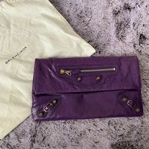 Balenciaga leather city clutch in purple